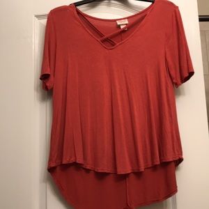 xsmall tee shirt. mix between orange and red